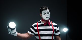 Zhiyun CINEPEER CX50 light held by a man dressed as a mime