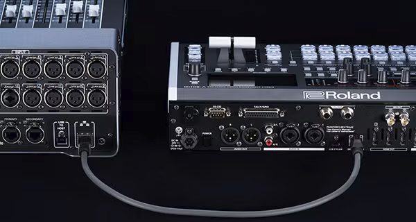 Roland V-80HD Direct Streaming Video Switcher and Yamaha DM3 Digital Mixing Console connected by a network cable