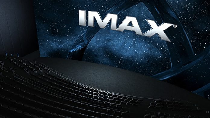 IMAX explores sale as shares climb 10%