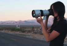 Photographer using Fujinon XF400mm super-telephoto lens