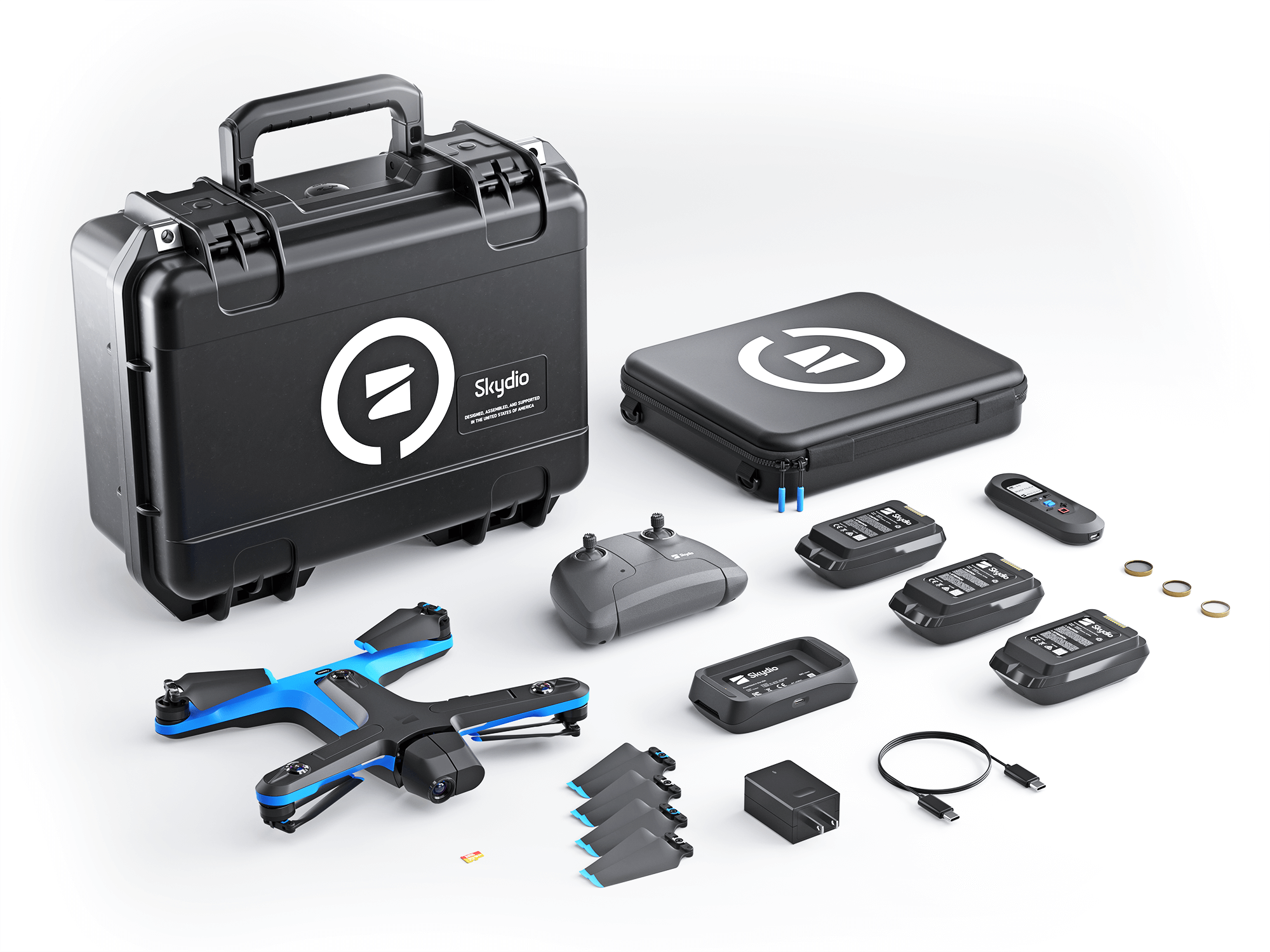 Skydio 2+ Pro Kit arranges in grid on white table