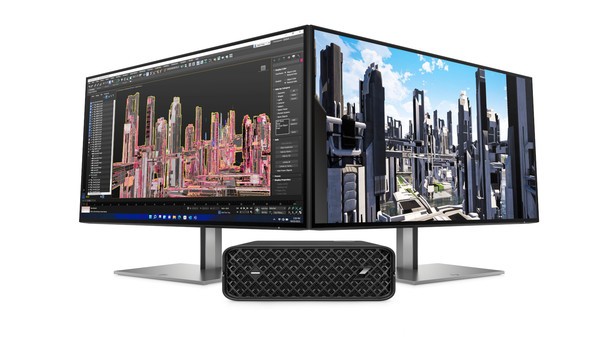 Two monitors with a 3D design workspace on the screens. The Z2 Mini G9 sits between.